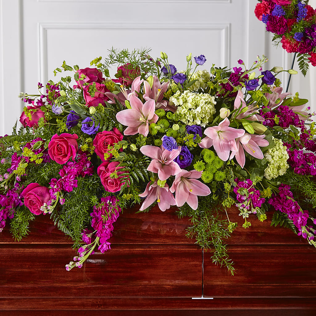 Radiant Tribute Casket Spray – Paiges Petals Floral Design, Stanton MI