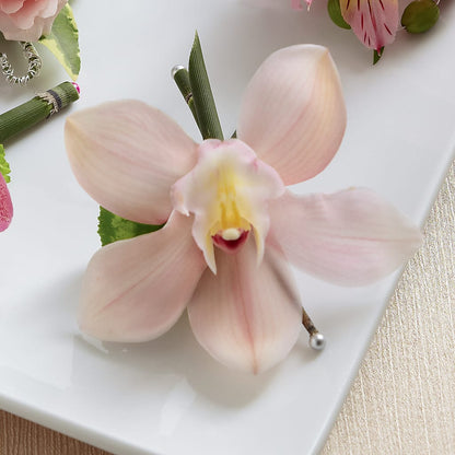 Pink Cymbidium Boutonniere –  Paiges Petals Floral Design, Stanton MI